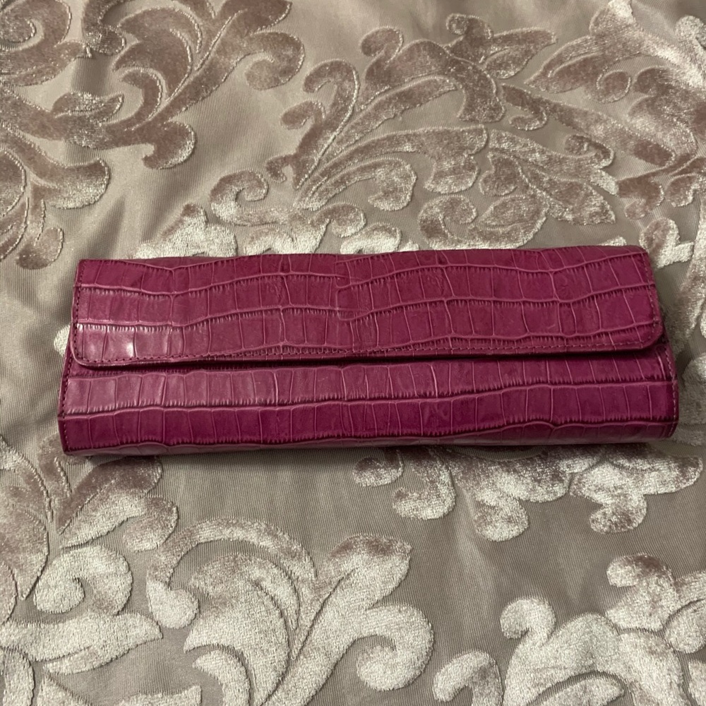 Fuchsia colored clutch